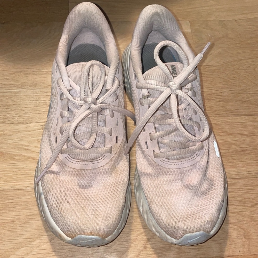 Pink and blue Nike tennis shoes